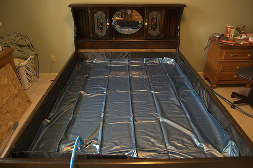 A Leak In Waterbed Bladder Mattress, Can You Put A Regular Mattress In Water Bed Frame