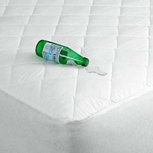 Protecting a mattress with a pad or a protector