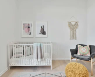 A room with a baby crib