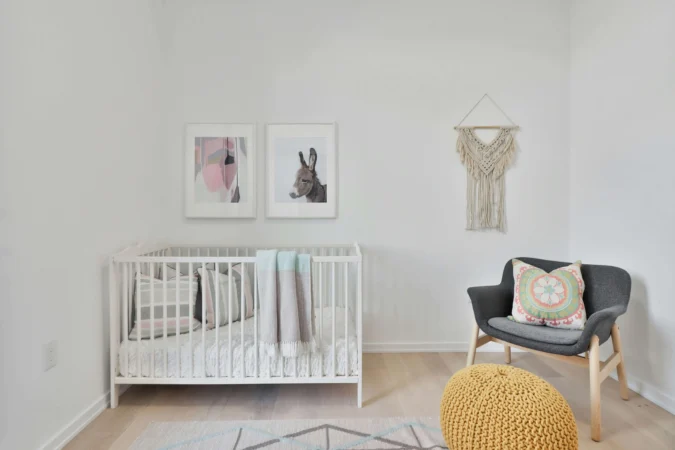A room with a baby crib
