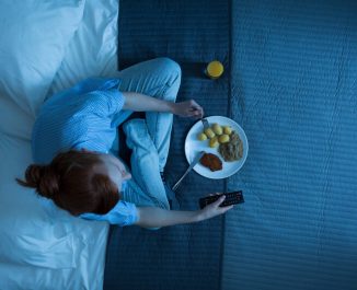 Why Eating In Bed Is Bad For You