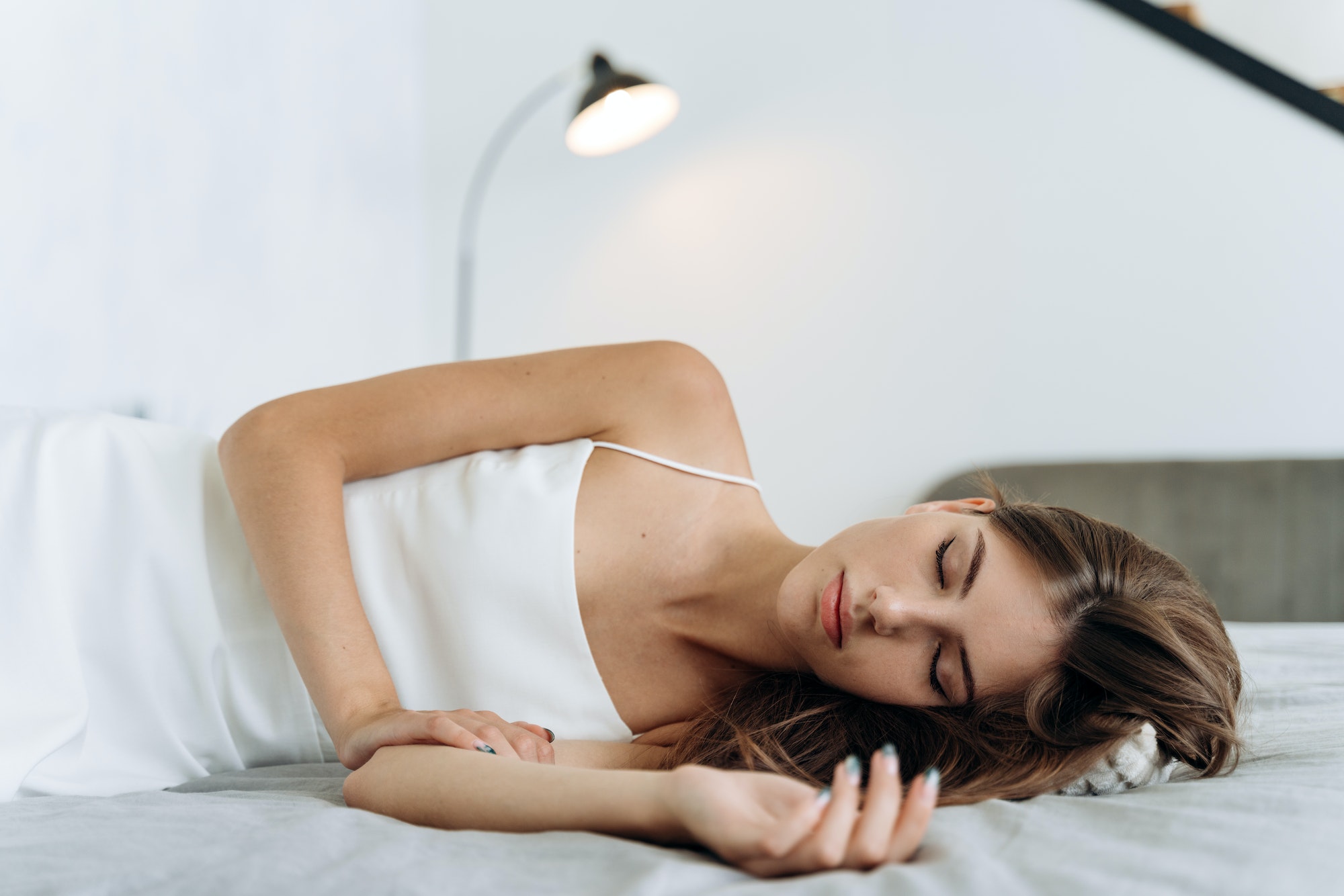 A woman getting healthier sleep.