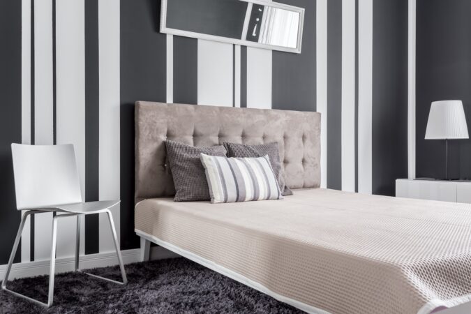 Comfortable bed in bedroom for a good night's sleep.