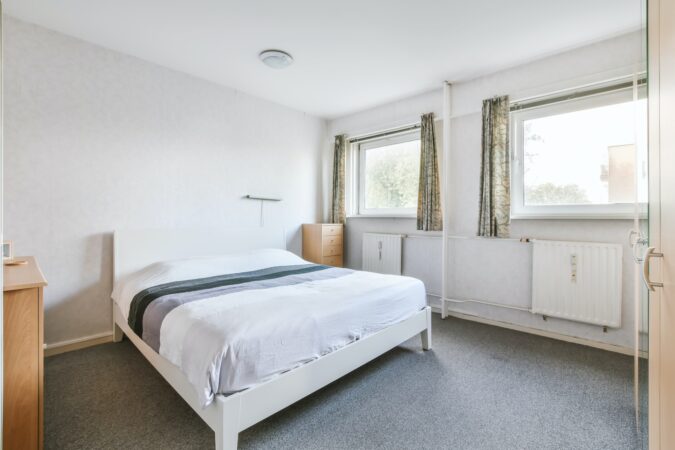 Comfortable bedroom with a cozy bed.