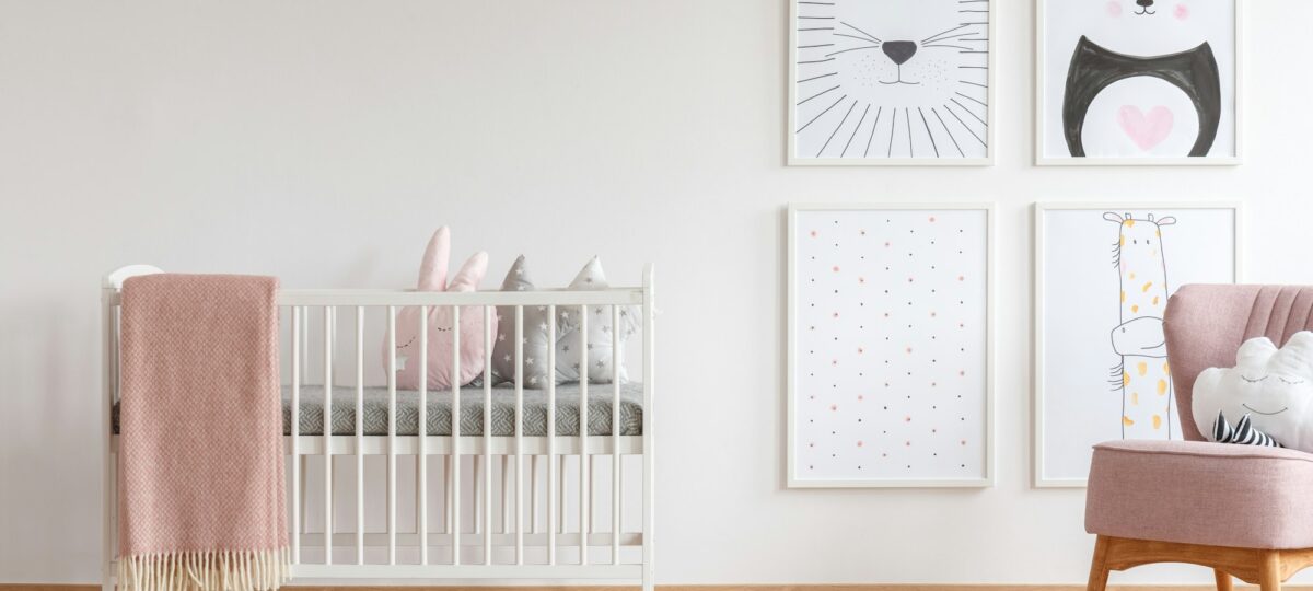 Crib in baby room. Baby bedding.
