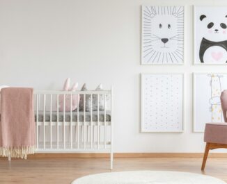Crib in baby room. Baby bedding.
