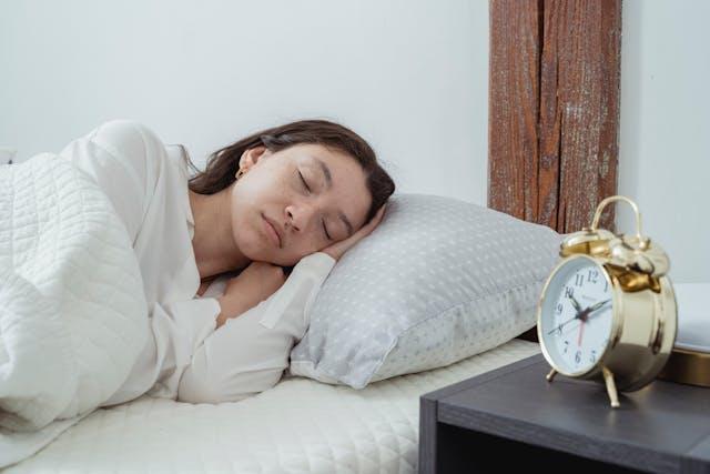 A woman sleeping. Buying a Mattress for Long-Term Use